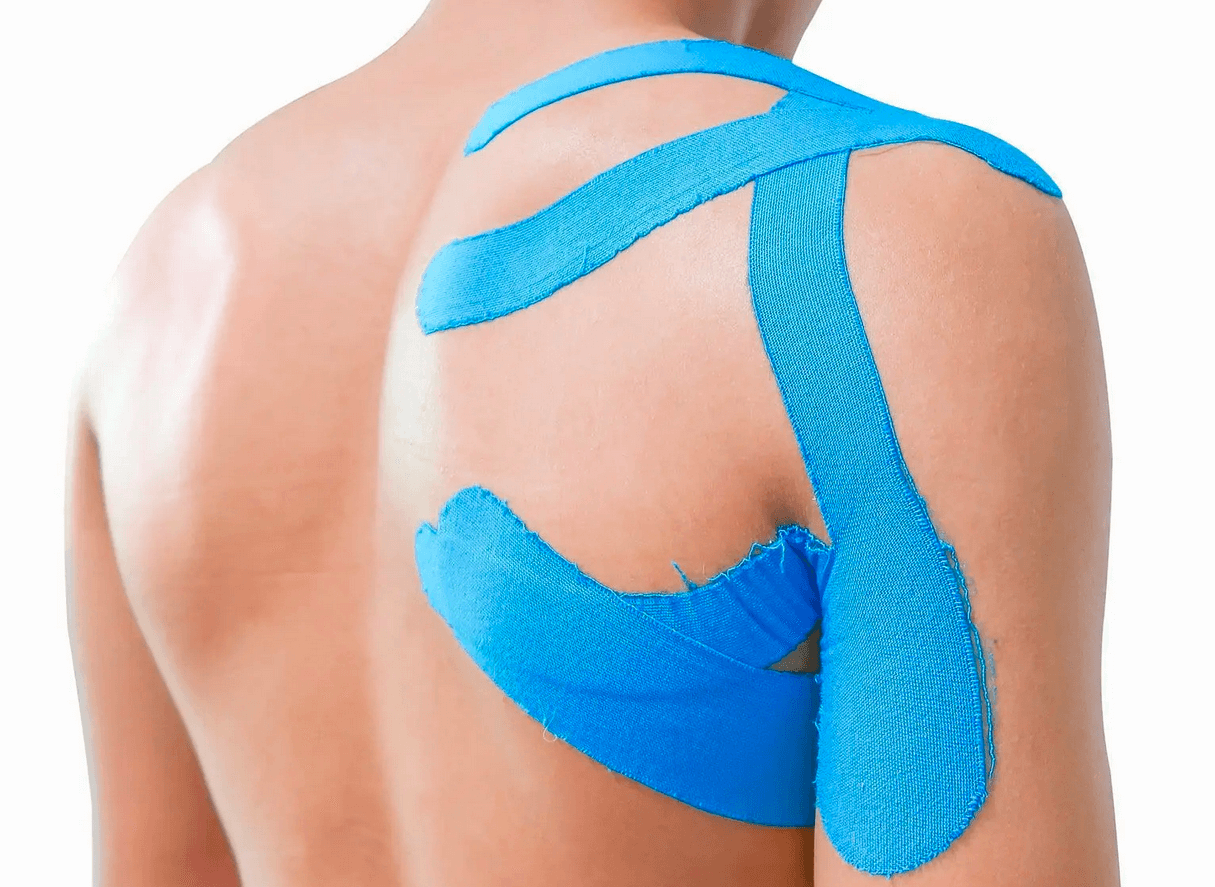 A man with a blue bandage on his back.